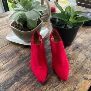 Red Jessica Simpson heels.8.